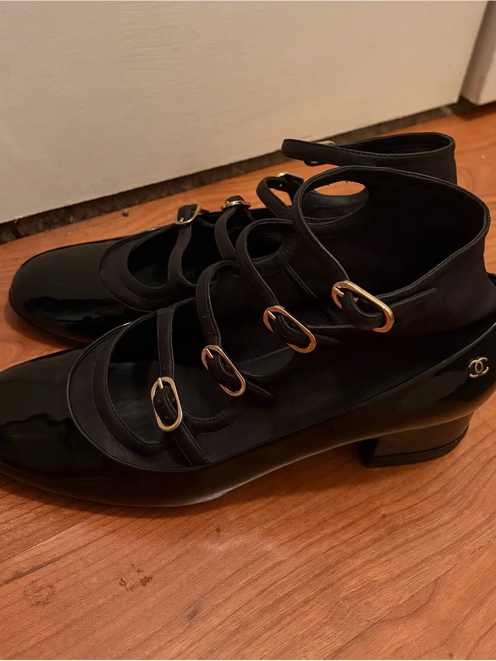Authentic Chanel Mary Jane Pumps in excellent pre-owned condition.